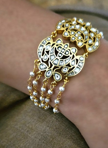 Pearl and kundan multi string bracelet